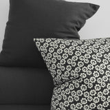 Black Pansy Cushion by Jessica Nielsen